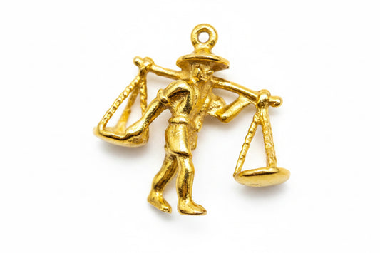 18 kt yellow gold charm Man Carrying Rice
