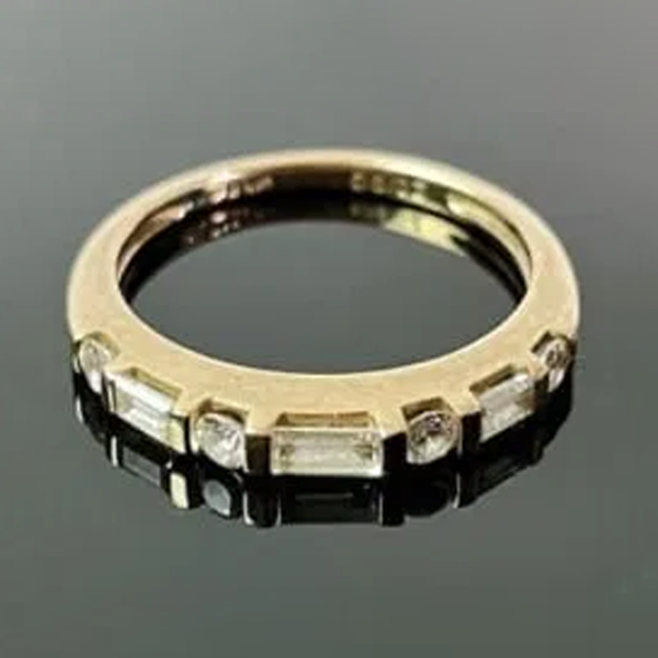 14k Yellow Gold .75 cttw Round and Baguette Diamond Ring