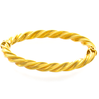 18kt Yellow Gold Twist Carved Design Bangle Bracelet